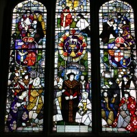 <a href="https://thomasmorestudies.org/st-dunstans-window/">View the details of St. Dunstan's "Thomas More Window" by clicking here.</a> Thomas More and Family Window